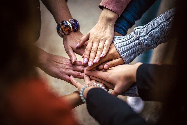 hands paying it forward during the holiday