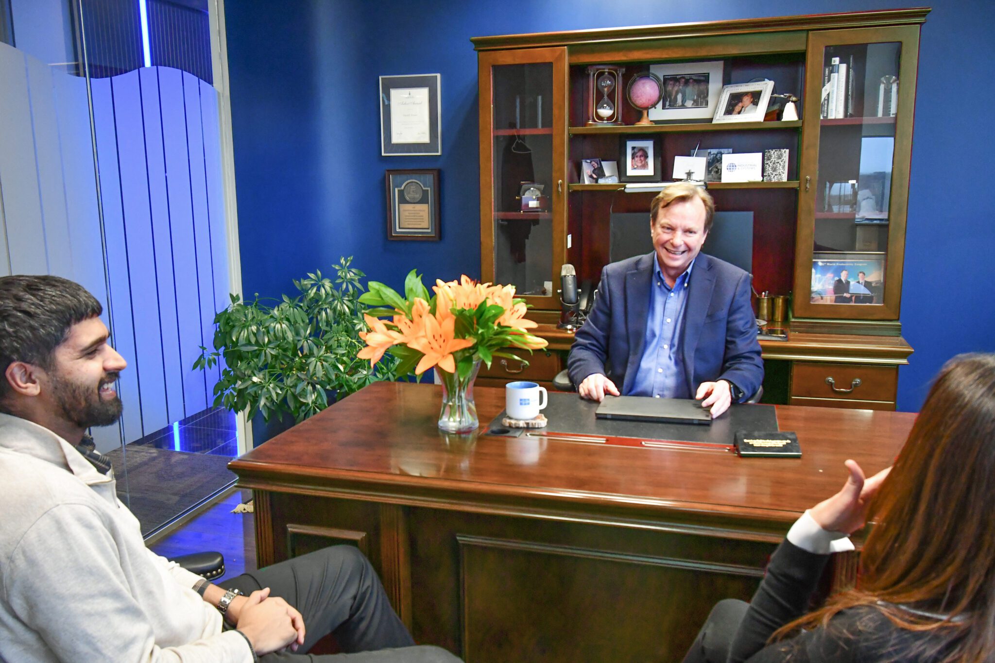 The Poirier Group CEO David Poirier in the office having a meeting