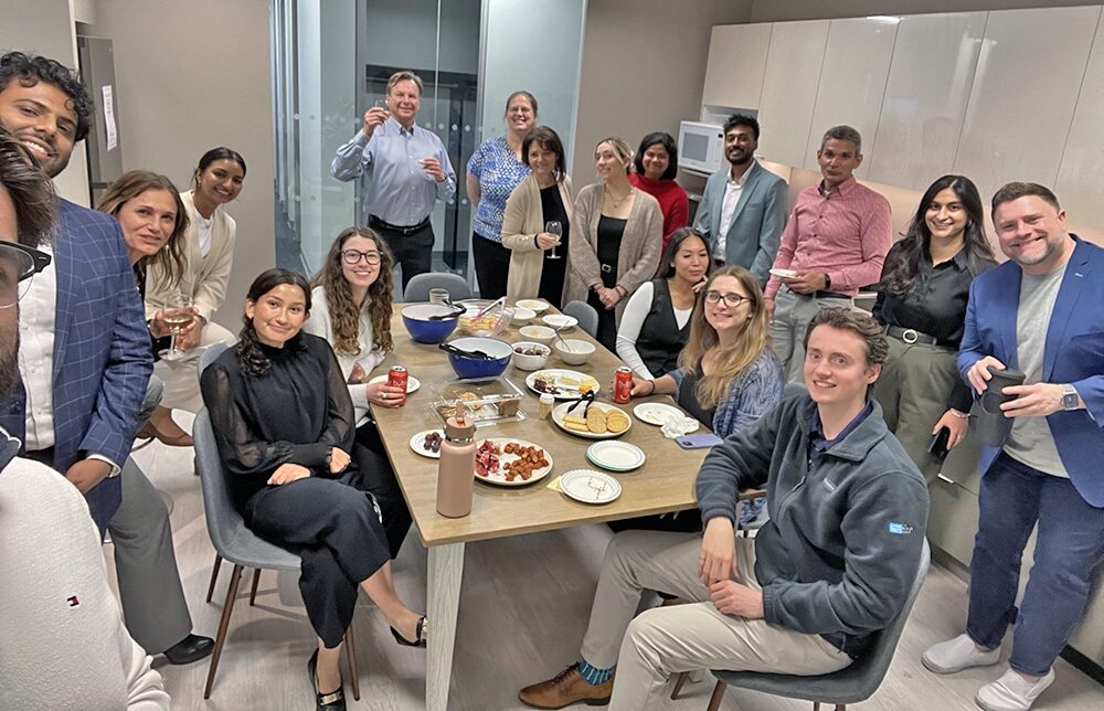 Team lunch and happy hour around a shared table