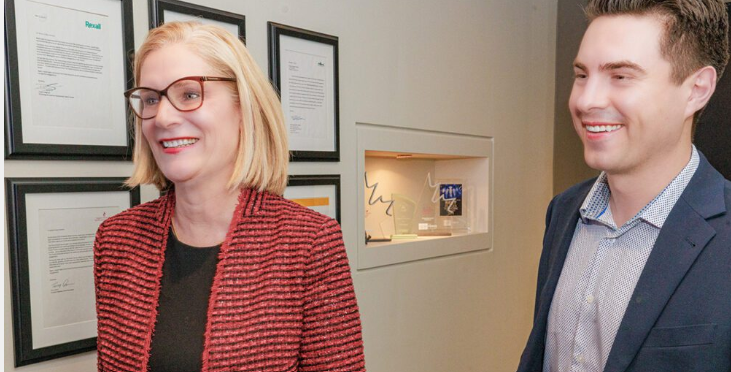 Employees share laughter at the office