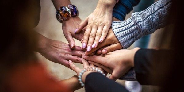 hands paying it forward during the holiday